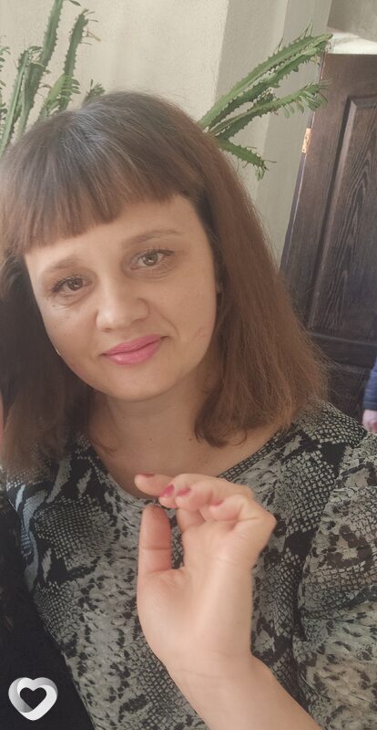 Мила