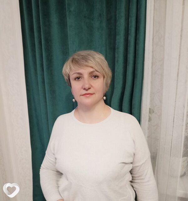 Мила