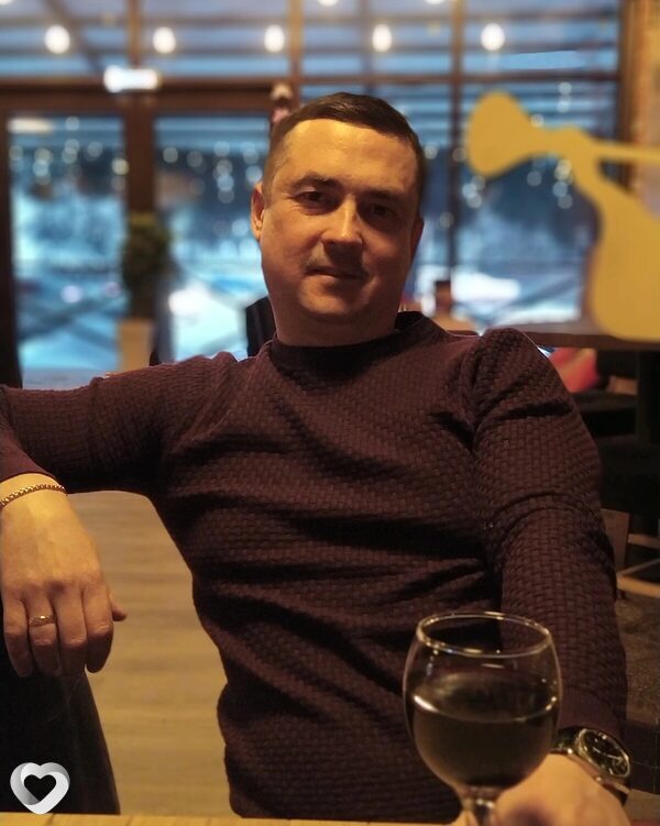 Николай