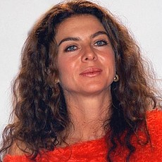 Мила