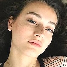 Мила