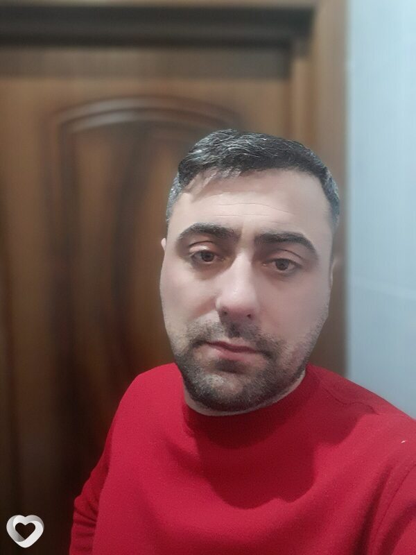 Николай