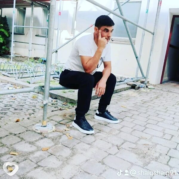 Николай