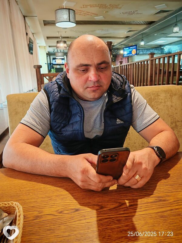 Николай