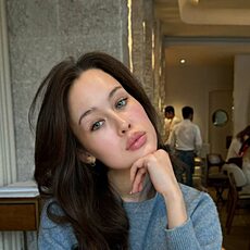 Мила