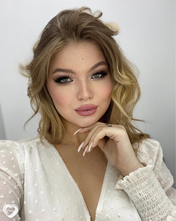 Мила