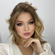 Мила
