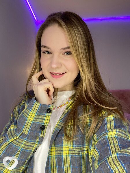Мила
