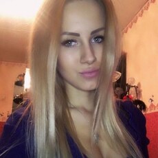 Оля