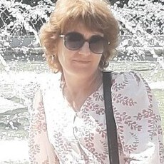 Мила