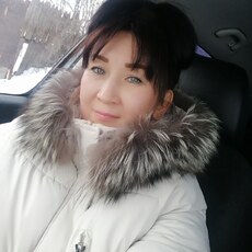 Мила