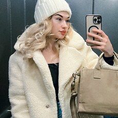 Мила