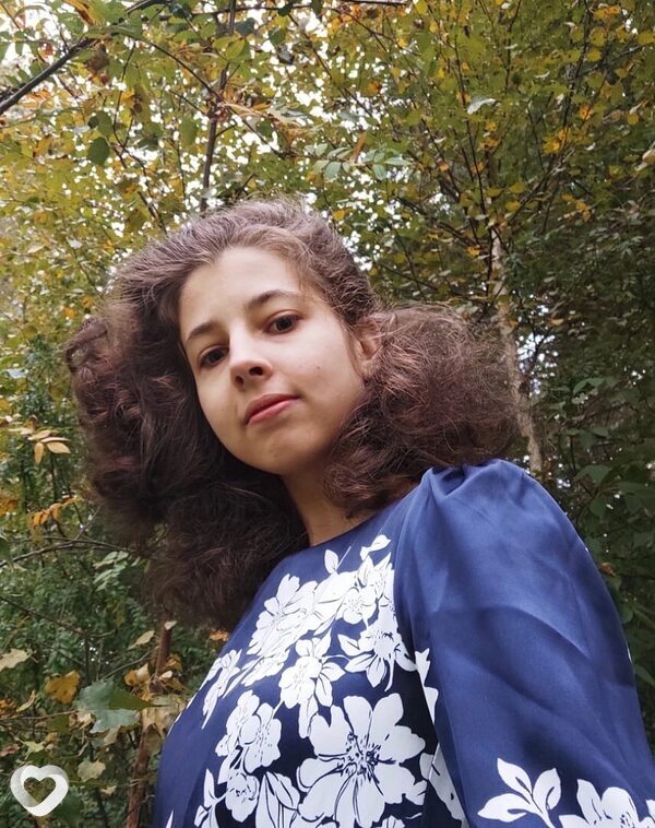 Мила