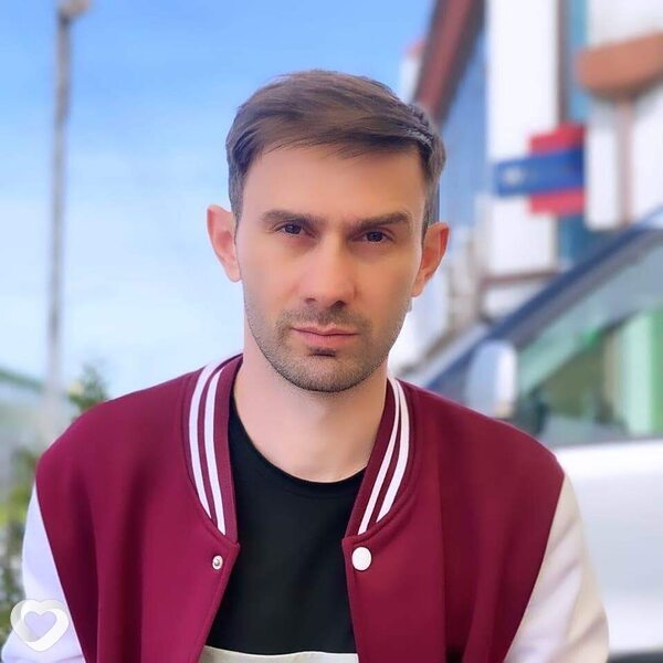 Николай