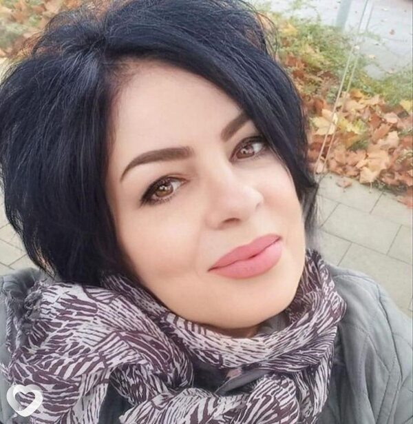 Мила