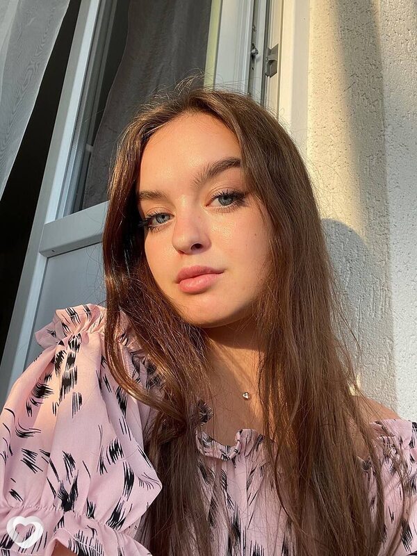Мила