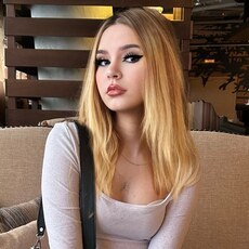 Мила