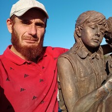 Николай