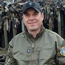 Николай